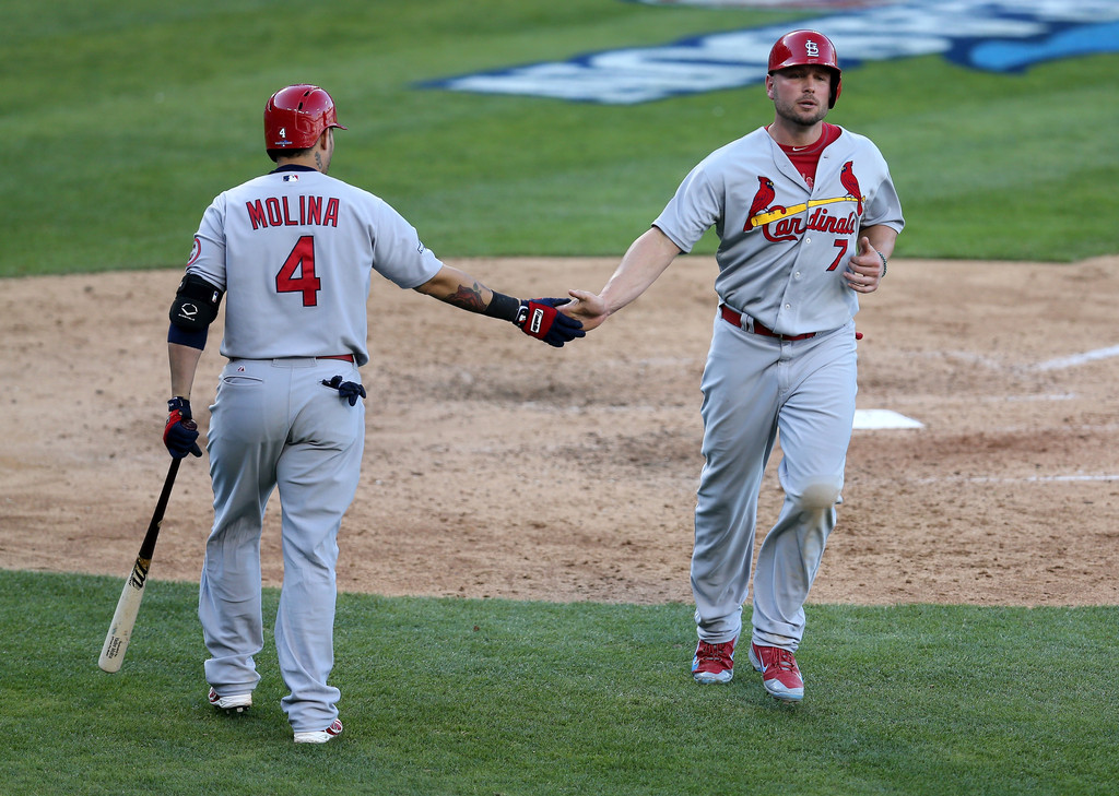 Carpenter y Holliday guían primera victoria de San Luis sobre Dodgers