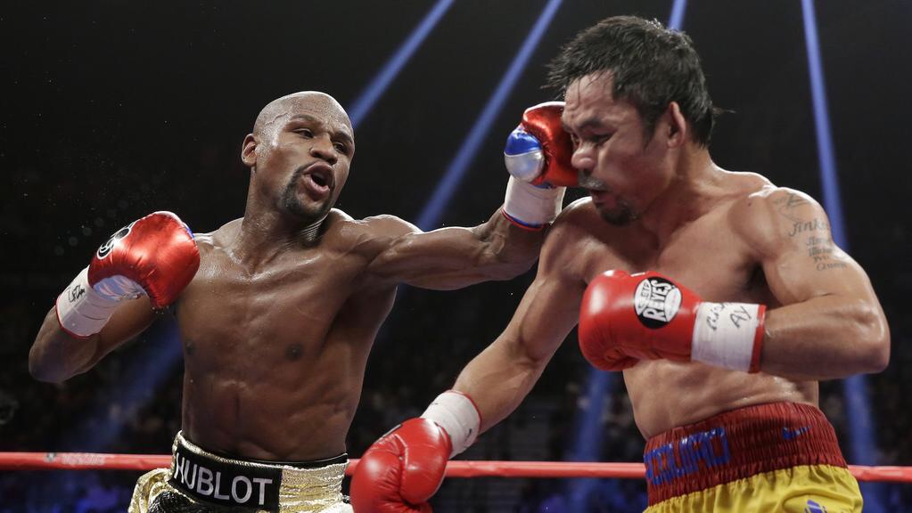 Mayweather ganó por decisión unánime a Pacquío